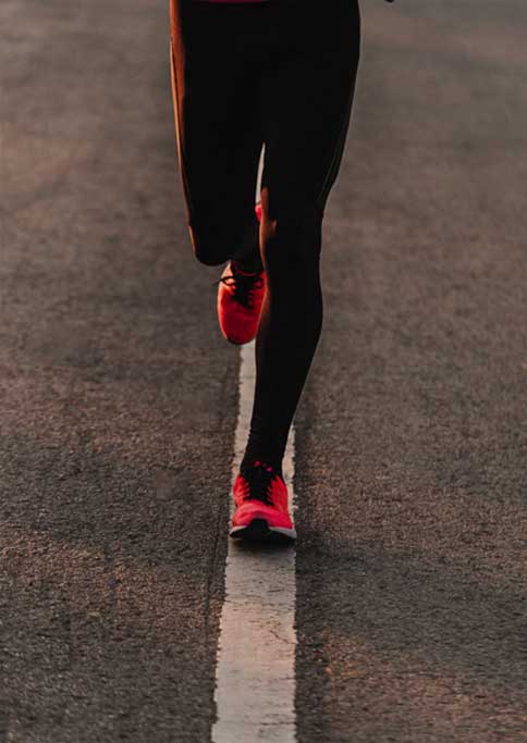 Close up of jogging in running shoes