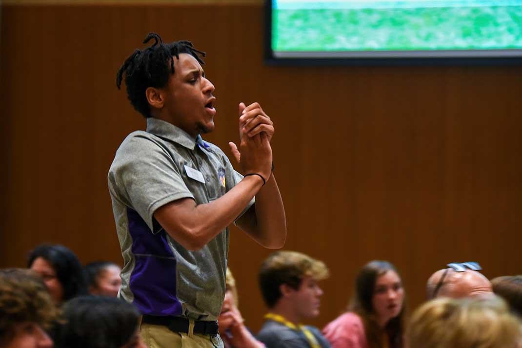 
 Orientation leader giving speech. 
