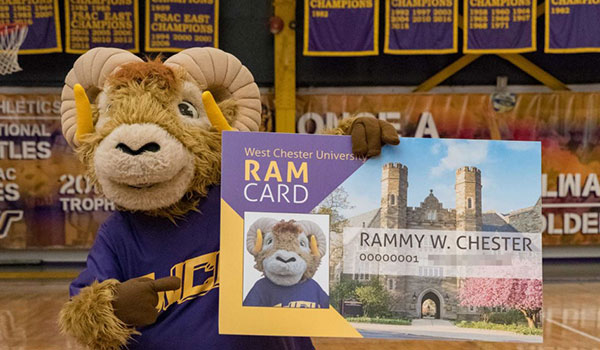 Rammy holding ID card