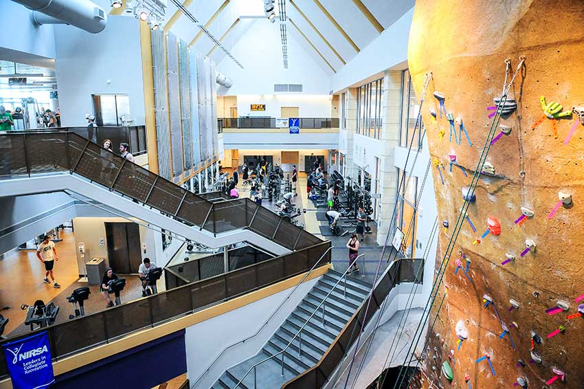 Inside photograph of WCU building with rock wall